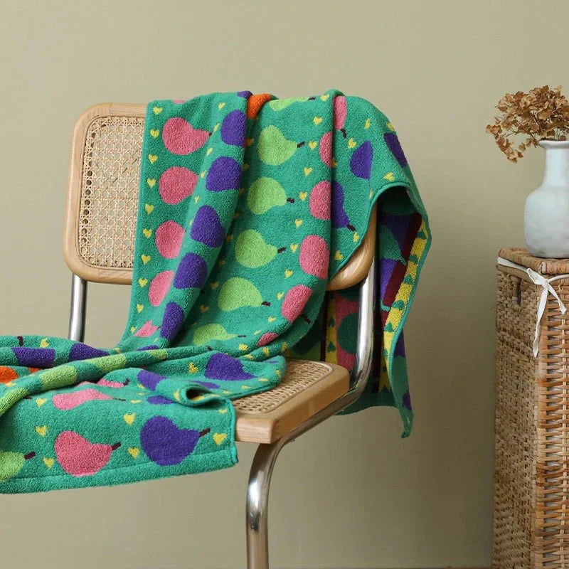 LoungeYard | Soft children's towel made of cotton with pear motif — product view 4